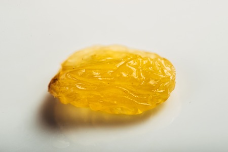 raisins isolated on white background. Popular dried fruit in different countries of the world.の写真素材