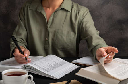 Girl studying at home. Self-education concept.の写真素材