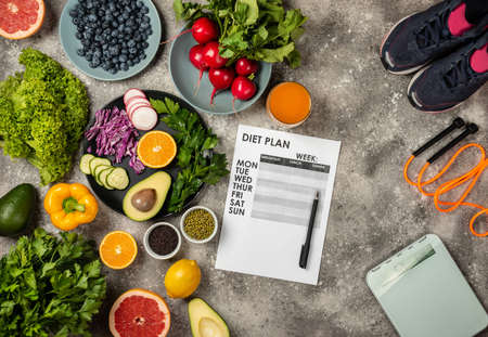 Healthy diet lifestyle concept. Weight loss program Fitness equipment Fresh food. Top view.の写真素材