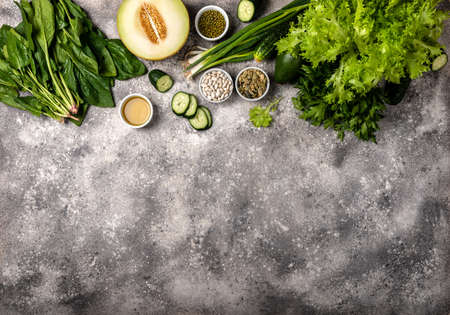 Border of vegetables and greens background with copy space top viewの写真素材