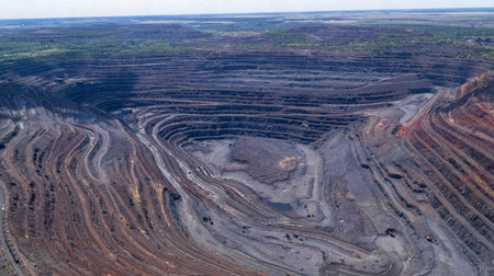 Open Iron Ore Quarry in summer day Aerial Top View