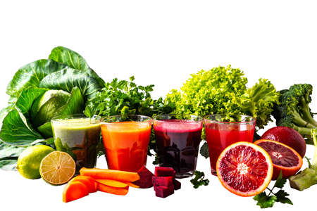 Healthy vegan drinks with fruits and vegetables on the white isolated backgroundの写真素材