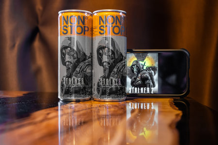 Kyiv, Ukraine - 02 September 2023: Cans Non Stop Stalker energy drink production for computer game...