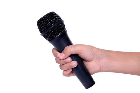 Hand holding microphoneの写真素材
