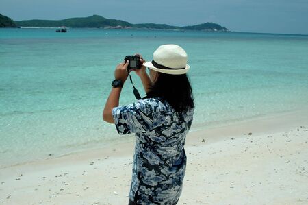 Man taking a photoの写真素材