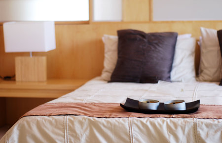 Modern bed room interior focus on the candles