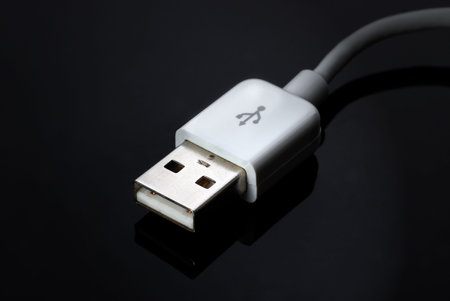 USB cable on black background