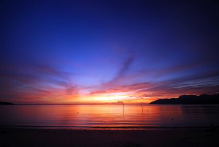 Sunset by the beachの写真素材