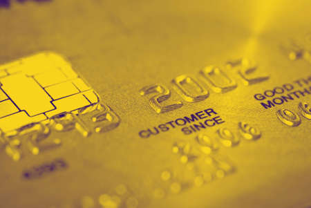 Gold credit card (closeup)の写真素材
