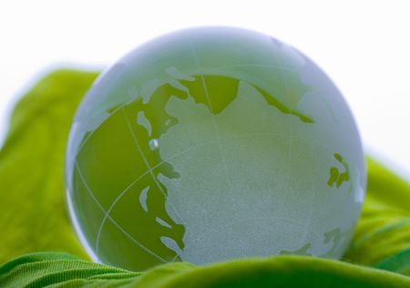 Globe on green satinの写真素材