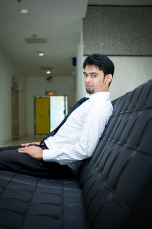 Man seating on the chair