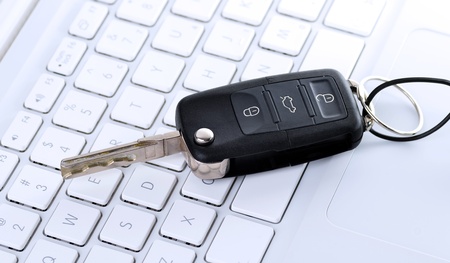 Car key on keyboardの写真素材