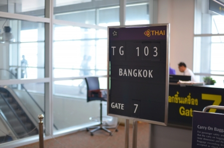 Chiang Mai, Thailand - May, 14 2012: Bangkok departure signboard inside Chiang Mai international airportのeditorial素材