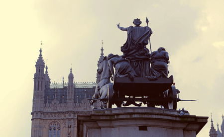 London, UK  March 28 2014  Boadicea Statue in front of Big Ben and the Houses of Parliament のeditorial素材