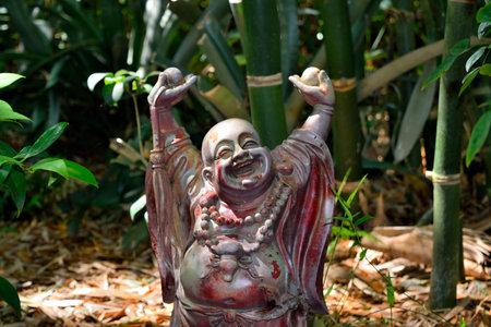 Happy Buddha in the Asian garden at Nature Coast Botanical Garden in Spring Hill, Floridaの写真素材