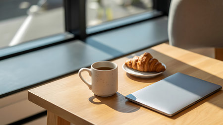 Coffee and croissant on wooden table in coffee shopの写真素材