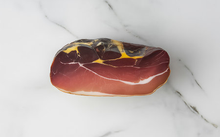 Italian prosciutto crudo or jamon on white marble backgroundの写真素材