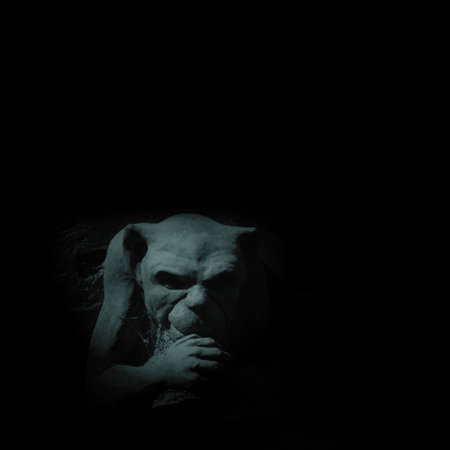 Gargoyle figure on black