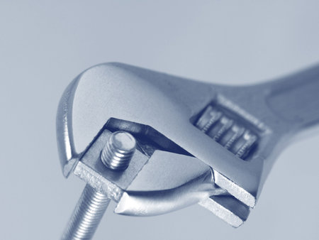 Adjustable spanner holding a roofing blt.の写真素材