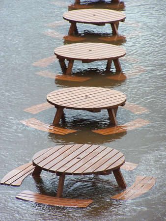 Flooding of River Ouse, York as a result of heavy rainfall. Photograph shows outside furniture under water.の写真素材