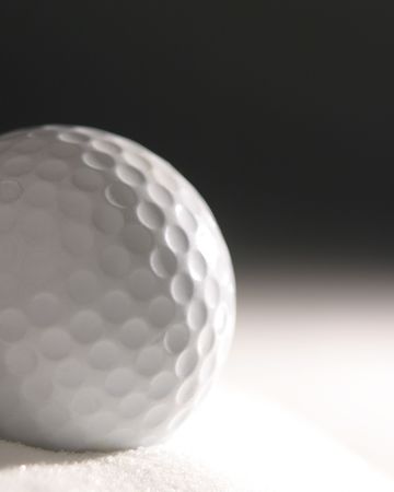 Golf ball in simulated sand duneの写真素材