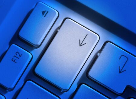 Computer laptop keys with blue lighting for effectの写真素材