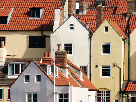 Whitby houses with red tiled roofs. Whitby, North Yorkshire, UK.の写真素材