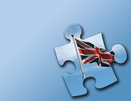 British Union Jack flag jigsaw piece on graduated blue background.の写真素材
