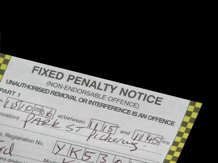 Close up of UK parking ticket on blackの写真素材