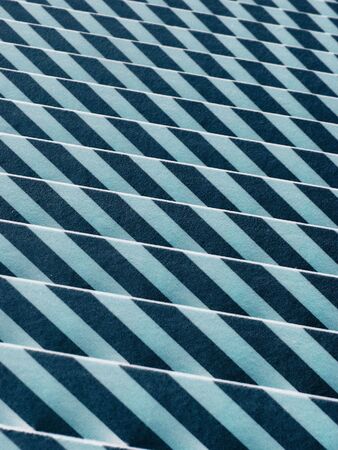 Shadows cast on wooden slats from sunlightの写真素材