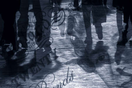 Composite abstract of shoppers overlaid onto UK currency noteの写真素材