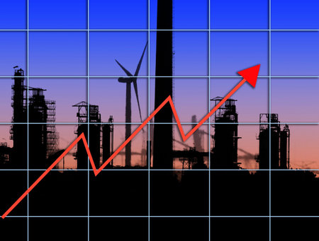 Silhouette of industrial scene overlaid with graphの写真素材