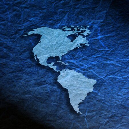 Outline map of American Continent on blue textured paper の写真素材