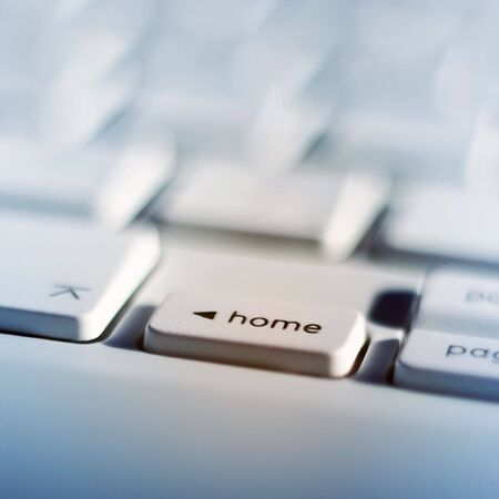 Close-up of home key on laptop keyboardの写真素材