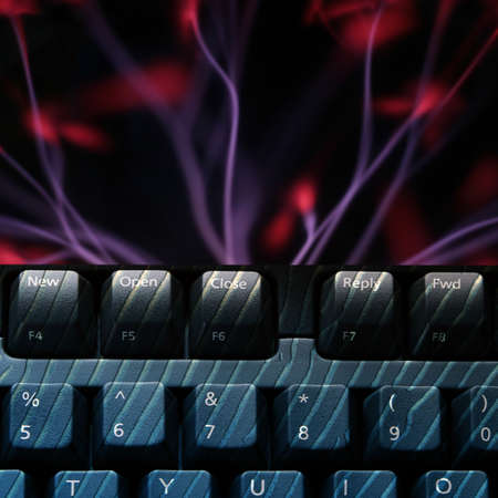 Blue abstract and plasma effect over keyboardの写真素材