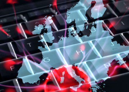 Laptop keyboard overlaid with Europe map and plasma effectの写真素材