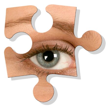 Eye jigsaw piece of eye over whiteの写真素材