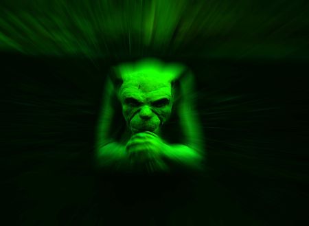 Green gargoyle figure with added zoom effectの写真素材