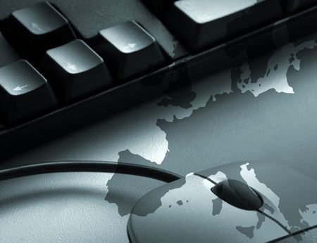 Keyboard and mouse overlaid with Europe mapの写真素材