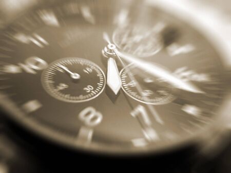 close-up of face of wrist watch sepia tonedの写真素材