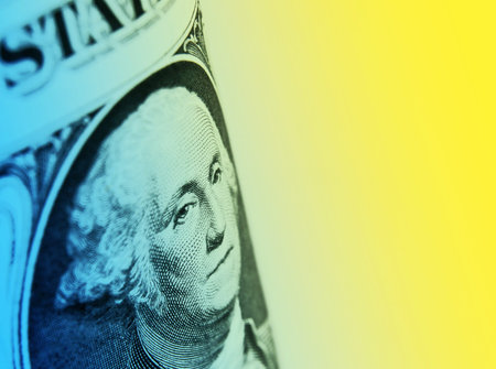 US dollar overlaid with yellow and blue colorの写真素材
