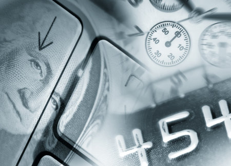 Combination image comprising of US Dollar, computer keys, watch and credit card