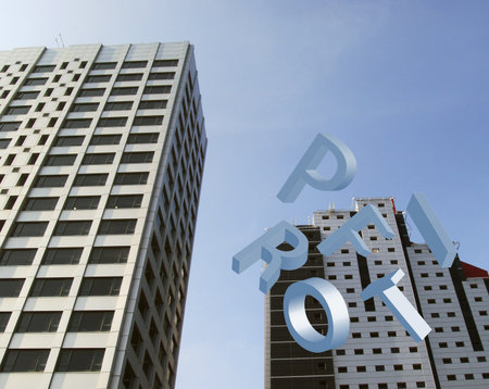 Two office blocks with falling letters spelling profit