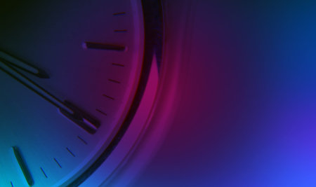 Watch face overlaid with blue and purple lighting