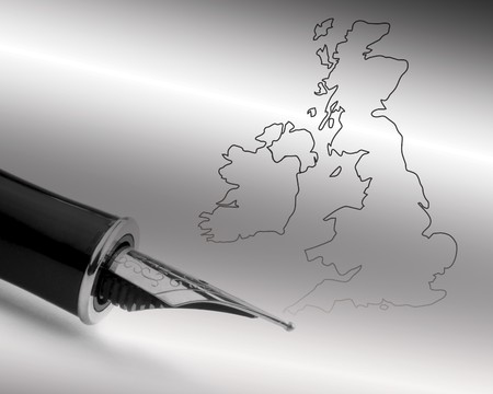 Close-up of fountain pen overlaid over UK outline mapの写真素材