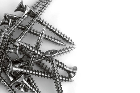 Close-up of crosshead screws on white backgroundの写真素材