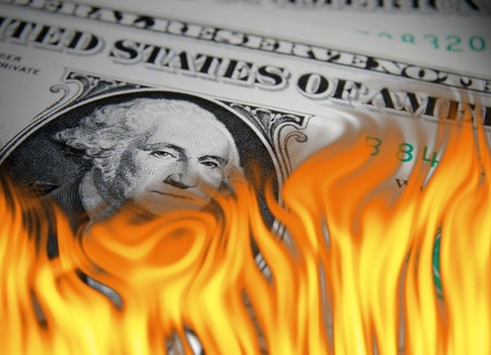 Flame effect applied to  close-up of US dollarの写真素材