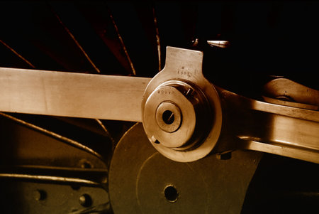 Close-up of steam engine wheel with brown color overlay