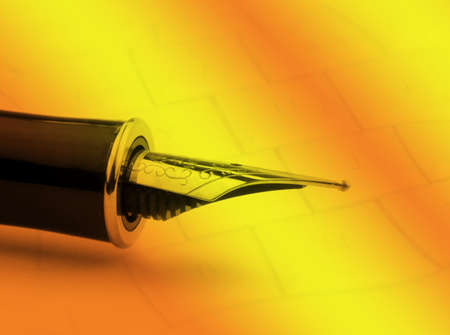 Close-up of fountain pen overlaid over computer abstract patternの写真素材