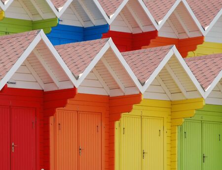 Rows of colorful beach huts in Scarborough, UKの写真素材